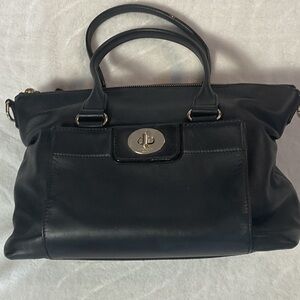 Black Kate spade bag for restoration